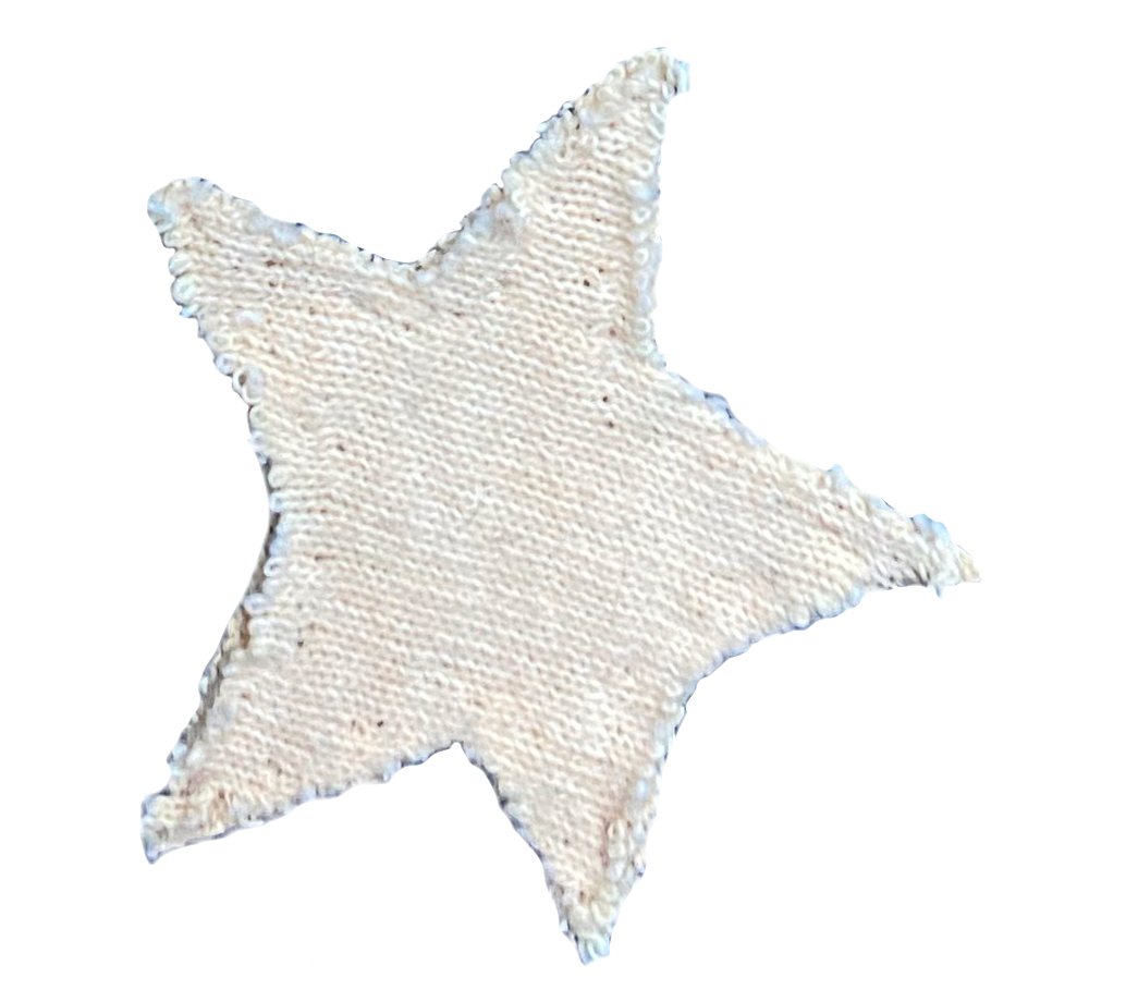photo of a light pink star cut from fabric
